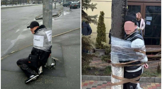 Ucraina, sciacalli legati ai pali della luce: i cittadini si fanno giustizia da soli contro i saccheggiatori
