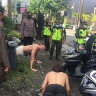 Turisti sorpresi senza mascherina, a Bali la multa insolita: costretti a fare 50 flessioni